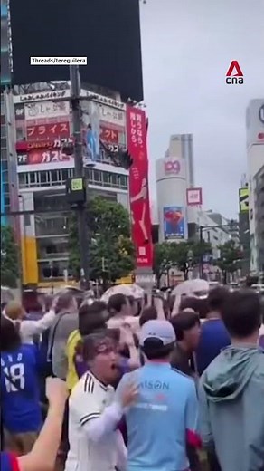Fans in Japan celebrate 2-2 draw with Netherlands at Shibuya crossing