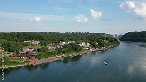 Aerial looking up the Niagara River viewing the village of Lewiston and the international border with Canada Queenston-Lewiston bridge in New York, United States, on a summer afternoon in July, 2024.