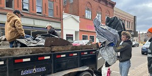 Volunteers clear debris from Calumet’s historic Ruppe building