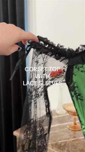 Stylish Corset Top with Lace Sleeves for Holiday Season