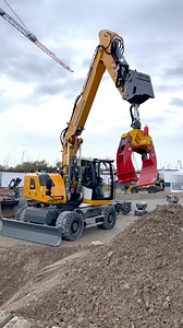 Liebherr's A920 wheeled excavator demonstrating its Likufix quick coupler system at their quarry space near Bauma last year | RPA Media