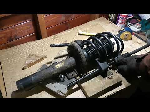 Car - Shock absorber spring change failure.