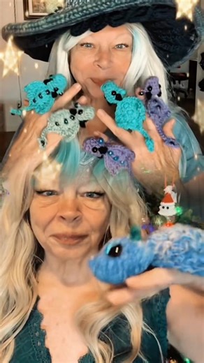 Crocheted finger dragons in 2 different sizes.