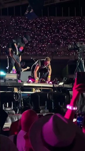 Coldplay stops concert after man with Israeli flag falls trying to rush the stage in Athens, Greece