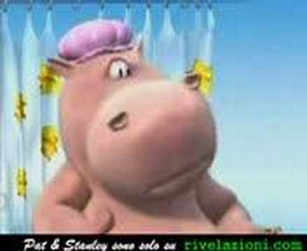 Dog and hippo playing in the bath