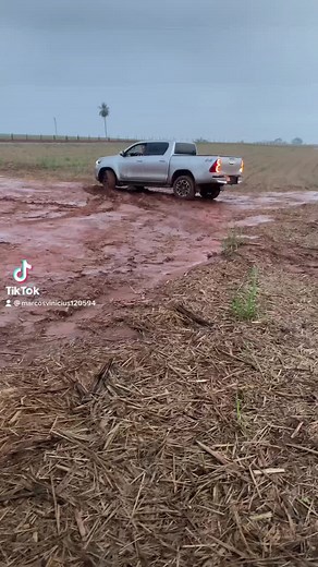 Driving a Modern Pickup Truck Through Muddy Fields
