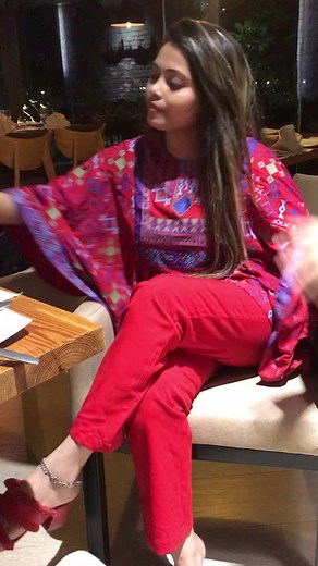 Traditional Dress Fashion in a Cozy Restaurant