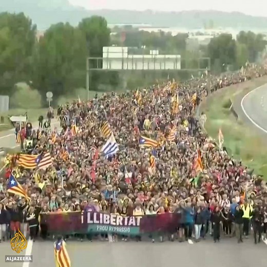 Tens of thousands of protesters from all over Catalonia converge in Barcelona in a mass demonstration over the jailing of nine separatist leaders. | Al Jazeera English