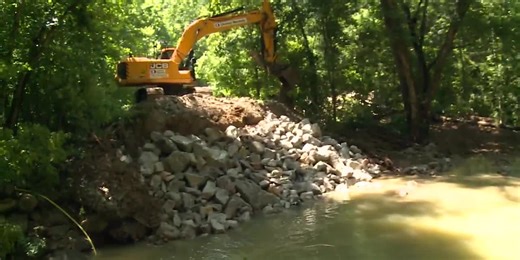 Flash flooding destroys bridge, leaves community stranded