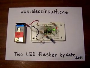 Two LED flasher by gate of IC4011