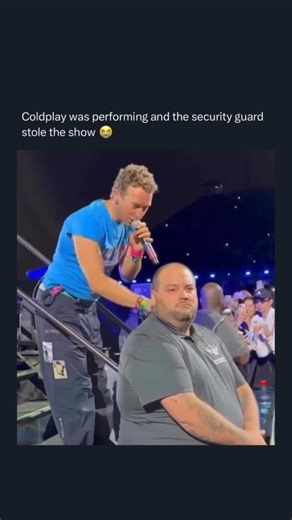 Served Fresh™ on Instagram: "At a Coldplay concert, frontman Chris Martin pulled a security guard up on stage, and the crowd absolutely lost it. What was supposed to be a simple moment turned into a spontaneous breakout performance: the guy donned one of the band’s alien-themed headpieces and started dancing, matching the vibe of the music and lighting in a way that stole the spotlight from the band for a sec. 🎶😄 The moment went viral online, with fans loving the pure joy and energy he brought