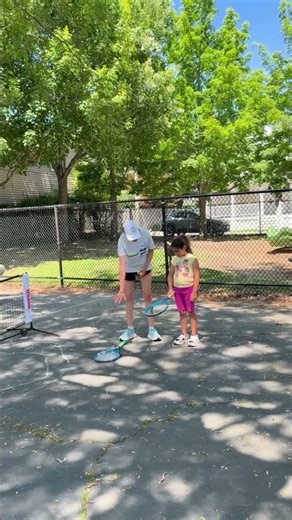 Tennis lessons with TeamFAME Community Outreach Program at the MLK