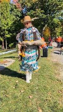 Jingle dress dancer at memorial for residential school children