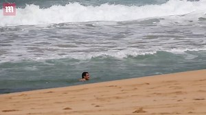 Orlando Bloom and Katy Perry enjoy a day at the beach in Hawaiian swimming