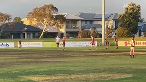 Port Adelaide legend Russell Ebert watches on as grandson Albert kicks 16 goals for SMOSH West Lakes Junior Football Club. 🏉 | The Advertiser