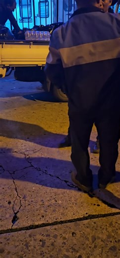 Outdoor Nighttime Cleanup with Pickup Truck