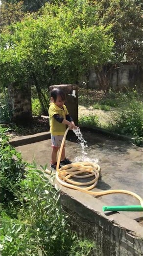 Cute Toddler's Joyful Water Play! 💦