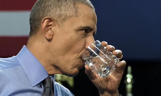 Obama drinks Flint water to show residents that it's safe – video