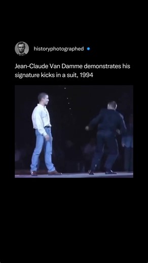 204K views · 2.3K reactions | In 1994, martial arts superstar Jean-Claude Van Damme demonstrated his signature high kicks and exceptional flexibility while wearing a business suit at a Budo Gala event. This iconic appearance, widely circulated online, showcased his physical prowess and ability to perform martial arts techniques in formal attire. Credit: Budo Gala | History In Pictures | Facebook