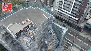 This afternoon crews responded to a partial building collapse on Railway Parade, Burwood. Strong winds loosened scaffolding on a building under demolition, leading to the incident. Nearby areas have been evacuated, with around 50 residents displaced. Fire and Rescue NSW crews are working alongside NSW Police Force, engineers, and other agencies to secure the site and safely dismantle the damaged structure under expert guidance. Firefighters, including a rescue unit and platform, remain on-site t