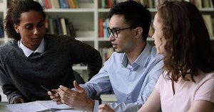 clip-1105763487-confident-smart-college-student-guy-glasses-talking