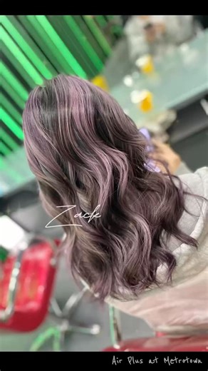 airplus hair salon Metrotown on Instagram: "Soft ash-mauve transformation ✨ We refined the previous brassy tones into a cool, dusty lavender shade. Keeping the natural root depth for dimension, with subtle highlights that show more under light. The waves and layering create movement while maintaining a clean, polished outline. Not loud. Not flashy. Just soft, refined, and quietly elevated. Stylist｜Zack Location｜Air Plus Hair Salon · Metrotown"