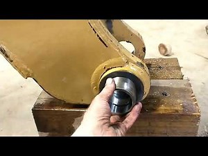 Line boring and machining bushings for a Cat 416 backhoe