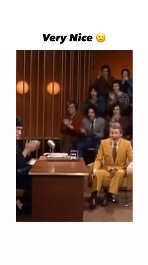 Maahii 🖤 on Instagram: "The Instagram reel features a 15-second colourised clip from Bruce Lee’s iconic 1971 Pierre Berton interview, capturing him demonstrating finger dexterity by spinning a small white object while discussing martial arts philosophy in a lively studio setting. Originally black-and-white footage, this Al-remastered version in vivid colours has ignited debates in replies, with users split on whether it represents genuine restoration or full Al fabrication, referencing tools li