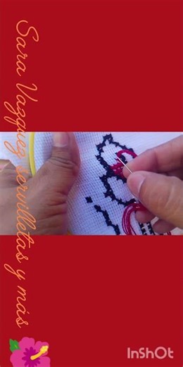We begin with this cross-stitch button by Sara Vazquez