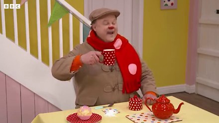 Mr Tumble helps Grandad Tumble with some new glasses