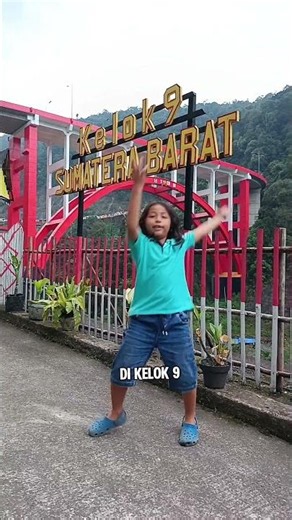 Papa Ara and Bagas at Kelok Sembilan Bridge, West Sumatra