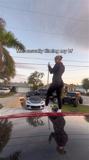 She's the kind of woman who'll hold the camera steady while you launch yourself off a ramp on a shopping cart, laughing as sparks fly and metal screams. Zero hesitation when you say "babe, film this," even if it ends with you eating asphalt or T-boning her bumper. She just zooms in on the chaos, yelling "again!" with that fire in her eyes.And the best part? She looks like a goddamn smoke show the whole time—hair whipping in the wind, that smirk that says she's in on the joke, hotter than the exh