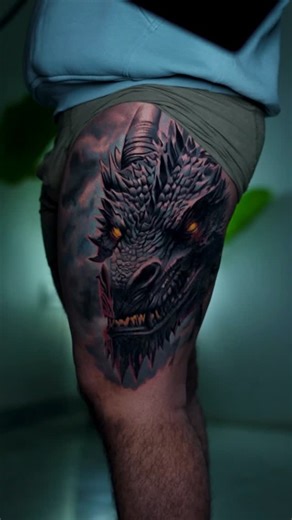 Pardeep Singh on Instagram: "Dark Fantasy Dragon Tattoo Hyper Realistic Work!” This full-thigh dragon piece is packed with depth, scales, texture and glowing eyes. One of the most detailed dragon tattoos I’ve done every stroke built to bring the creature alive. Tag someone who would love this piece! Artist: @pardeep_artist13 Studio: Dink Tattooz | Punjab #dragontattoo #realistictatto #darkfantasyart #thightattoos #dinktattooz #tattooartistindia"
