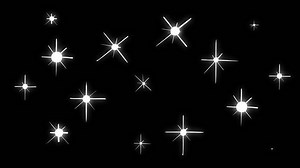 Shining stars on a black screen. The concept of a sparkling clean surface. Animation of the effect of a new beautiful surface of the object. Stock 4k video with alpha channel.