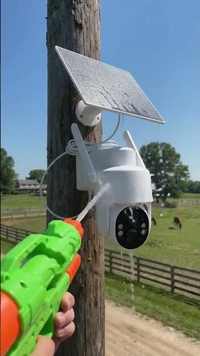 Solar-Powered Simulated Surveillance Camera Street Light