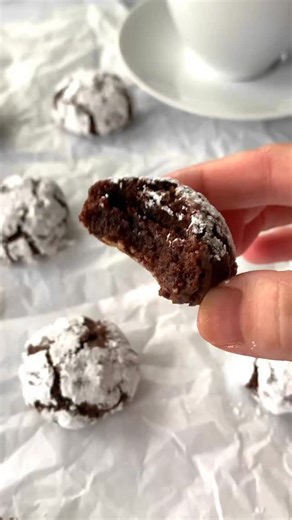 The classic Italian amaretti cookie is taken to the next level by adding cocoa powder, instant espresso, and a crackly powdered sugar exterior. These cookies have a soft and chewy bite with a crispy meringue-like exterior. SAVE this post and visit the link in my bio for the full recipe! Perfect for your holiday baking! ✨ #italiancookies #christmascookies #holidaybaking | Olivia's Kitchen