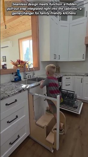 Hidden pull-out cabinet step stool for kids access.