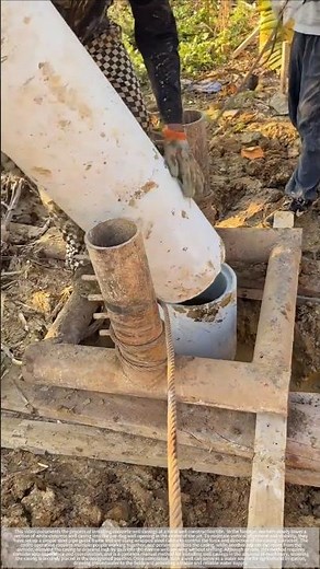 Installing pipes in the well to draw water for irrigation of farmland.