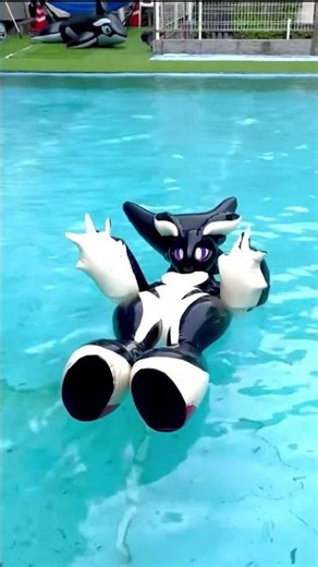 zentaiA latex inflatable zentai orca fursuit floati...