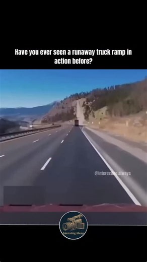 @interesting.always on Instagram: "Runaway truck ramps are one of highway engineering’s most dramatic yet lifesaving features - built to safely stop trucks that have lost braking power on steep grades. Often seen along mountain passes or long descents, these ramps use physics and friction to convert a vehicle’s kinetic energy into resistance, bringing it to a stop without overturning. There are several types of ramps, but the most common are gravel arrester beds, which use deep layers of loose g