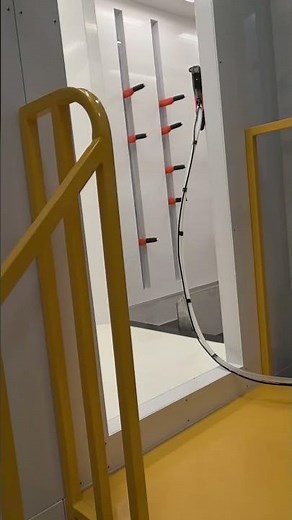 Automated Powder Coating line equipped with quick-change powder coating booth.