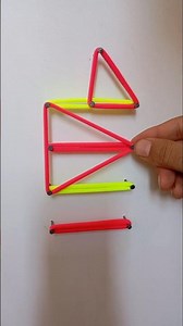 1. Calligraphic artwork of the artistic name “Allah” made with colorful rubber bands.