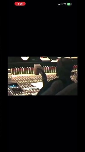 Tupac in the studio listening to Hit Em Up after recording it