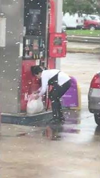 lady puts gas in plastic Bag