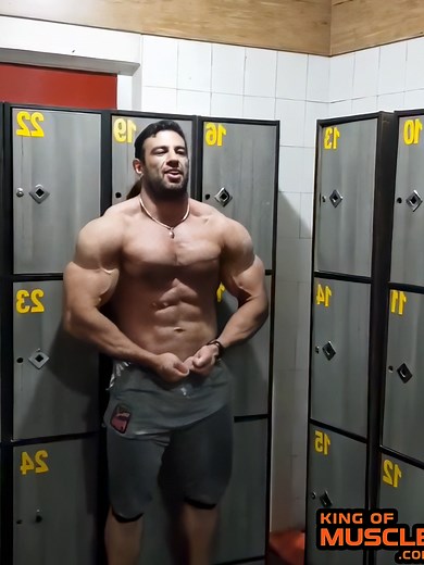 ‏Gym locker room posing