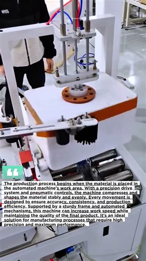The production process begins when the material is placed in the automated machine's work area.