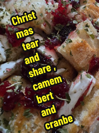trying out Christmas sourdough tear and share recipe slice sourdough into squares but not all way through... pour small amount of melted butter and parsley in between cracks,then fill with cubes of camembert and dollops of cranberry sauce .. put in 180 oven for 10 15 mins until camembert melted..enjoy #food #recipe #fyp #christmas