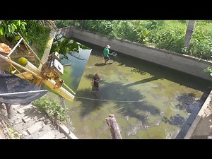 How to Drain a Concrete Pond with a Gasoline Engine Pump