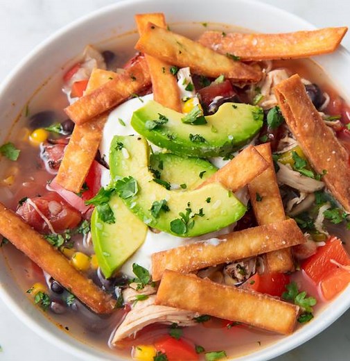 Slow-Cooker Chicken Tortilla Soup is the no-fuss way to warm up. Full recipe: http://dlsh.it/vlMiy4H | Delish
