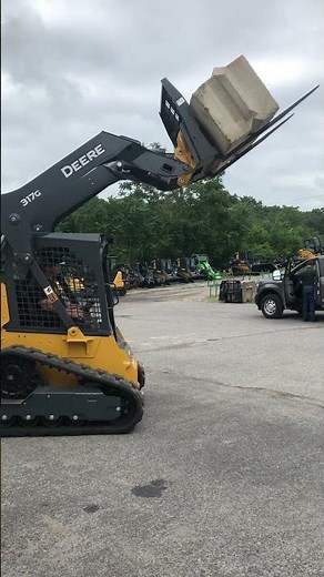 John Deere 317G track loader doing some heavy lifting!